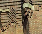 Detail gevel met bakstenen versieringen en basis voor vlaggenmast.
<br/>
Gert-Jan Lobbes, 2015